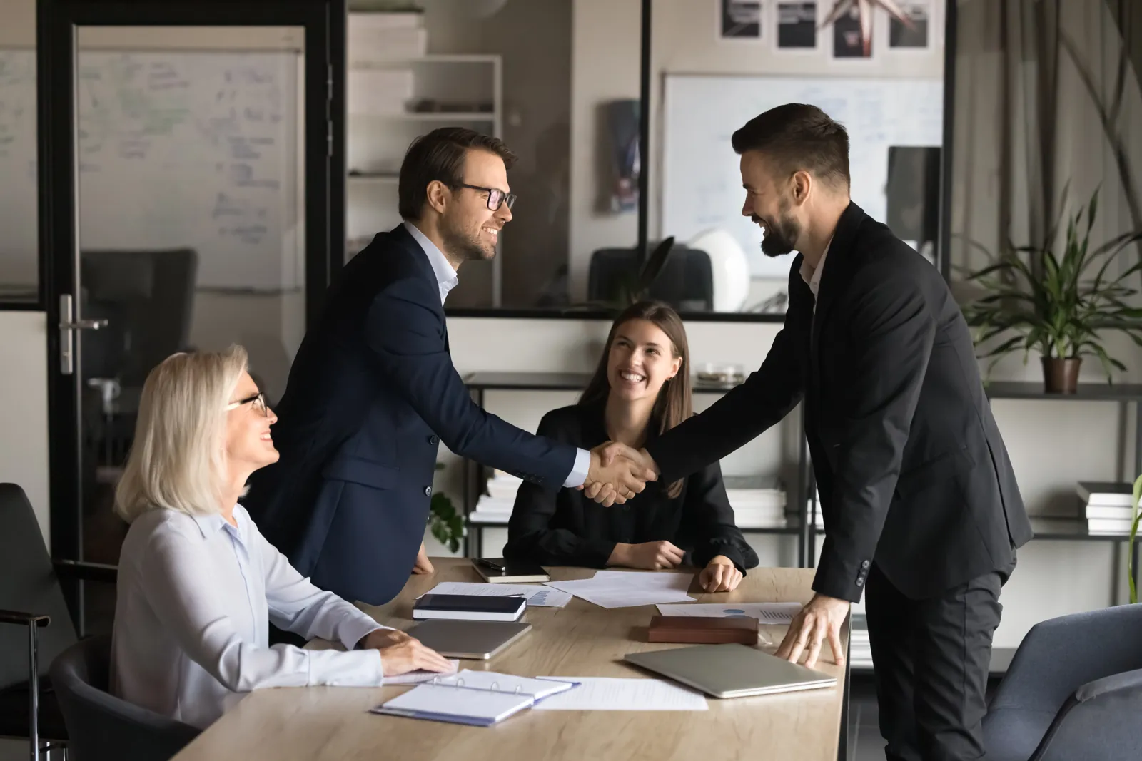 Business partners shaking hands